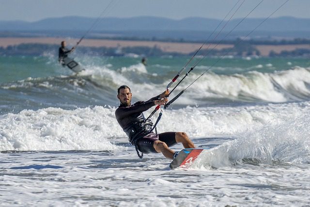 A man kite surfing