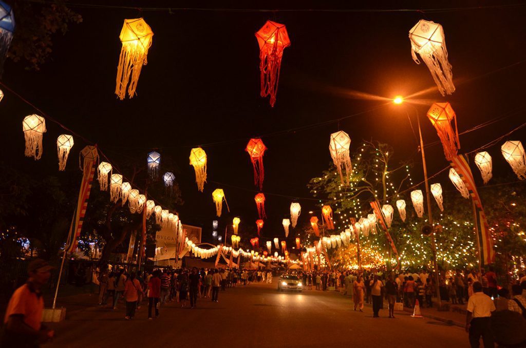 A street lighten up by lanterns
